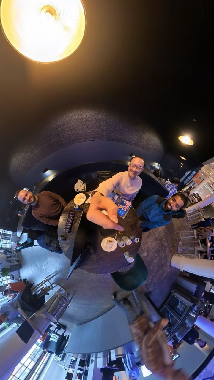 Vincent DiPaola, Maik Luu Bach, and Arnab Sikdar at Betaworks during the multi-agent hackathon, captured in a 360-degree photo.